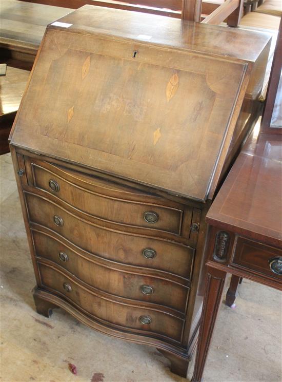 Small serpentine front mahogany bureau